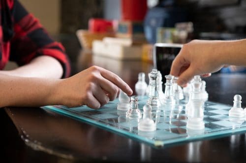 Employees from PQA play chess